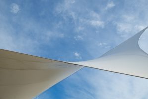 white-detail-big-top-tent-against-blue-cloudy-sky-alicante-costa-blanca-spain-min